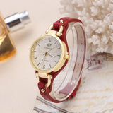 Ladies' watch with gold-colored dial